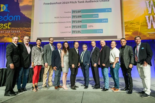 Jeff Barnes with participants on stage at the FreedomFest 2019 Pitch Tank in Las Vegas